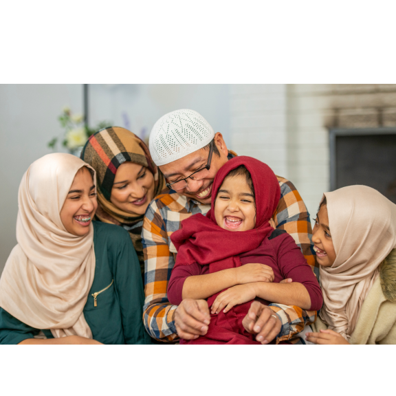 Laughing family wearing Hijabs