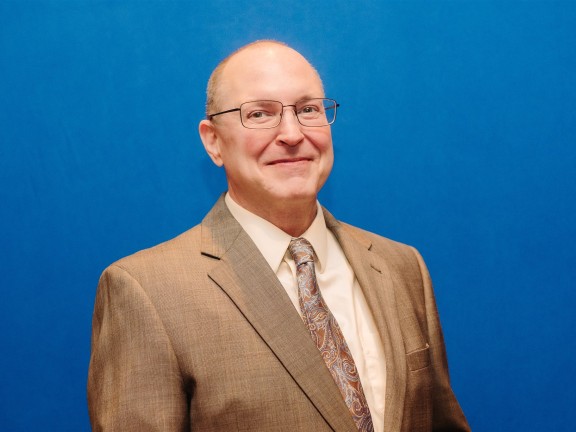 headshot of board secretary, Robert Haussmann