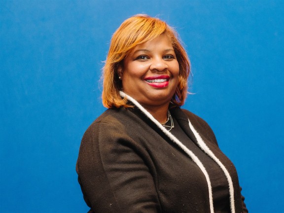 headshot of Board member, Kina Smallwood Butts