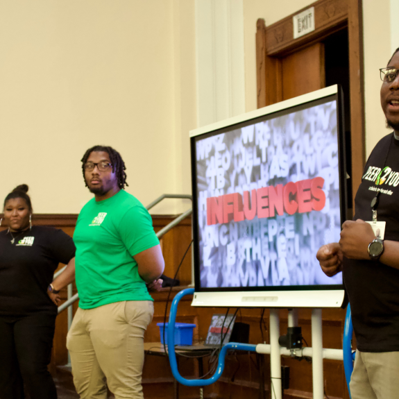 Mentors at an assembly 